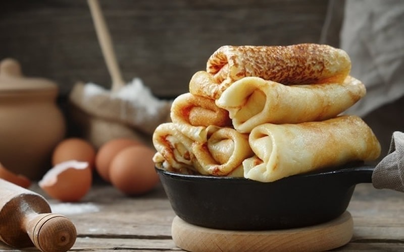 Crêpes con boudin e fonduta