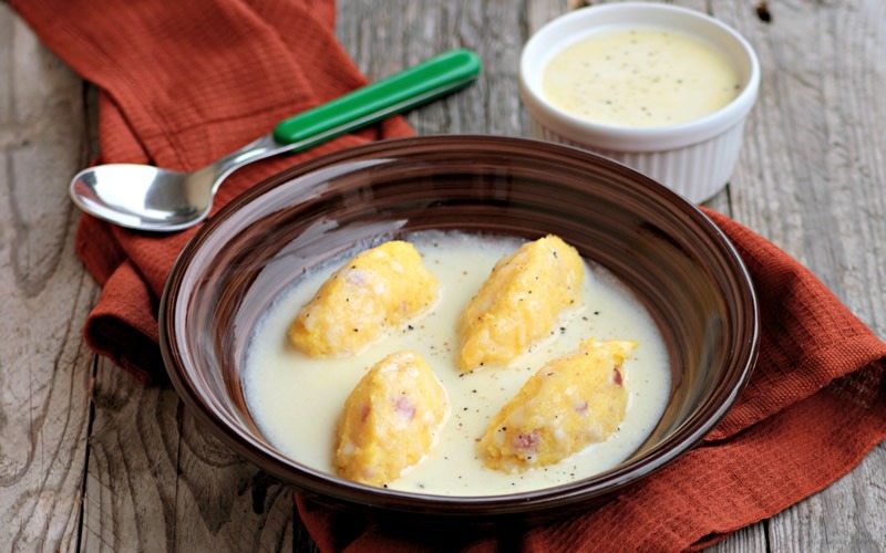 Quenelle di polenta con fonduta